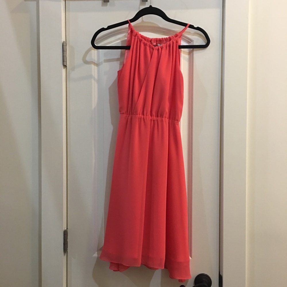 Peach knee length bridesmaids dress